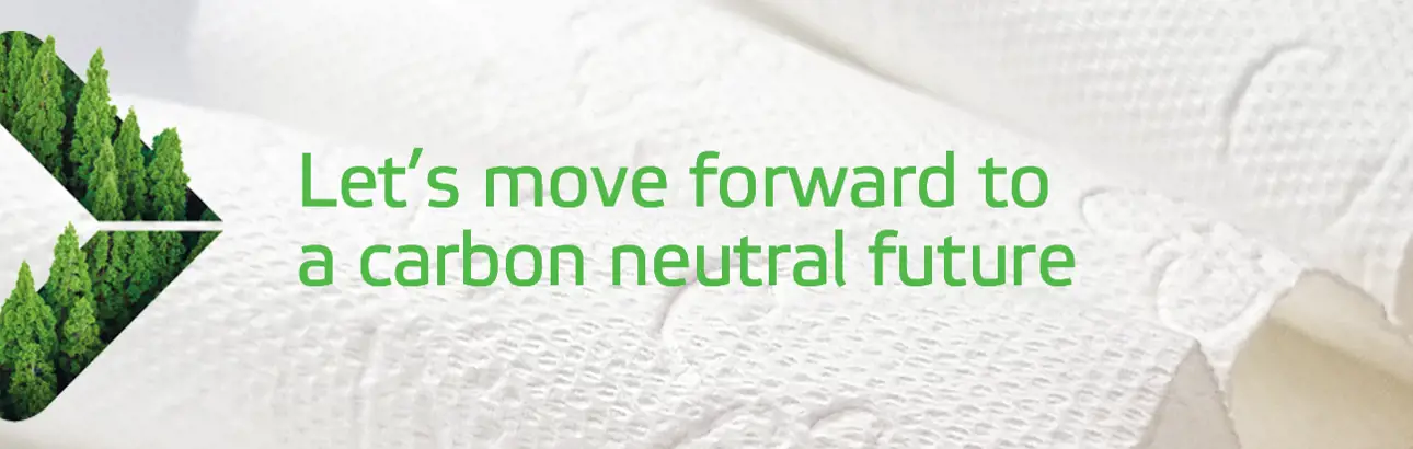 Tissue paper products alongside a green arrow featuring the text: 'Let’s move forward to a carbon neutral future.