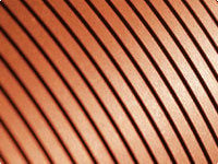 Grooving a suction roll improves water transfer and makes the cover more compliant.