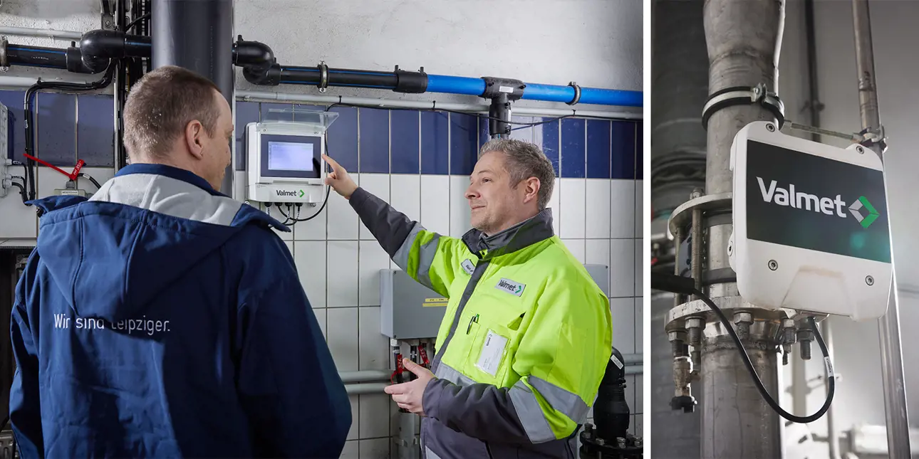Two men standing in front of Valmet Total Solids Measurement installed at Leipzig Wastewater Plant