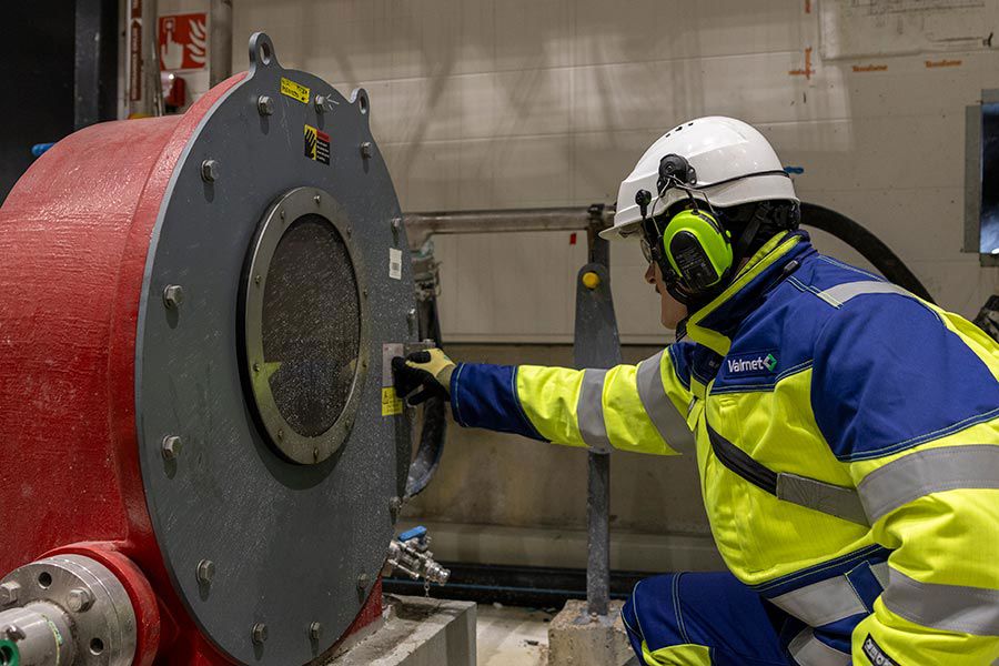 Valmet expert Olli Hinkkainen checking Flowrox hose pump
