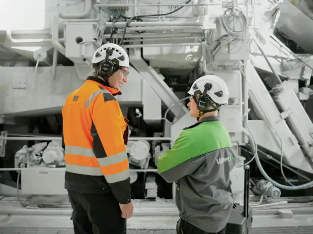 Spare part expert handing spares to customer