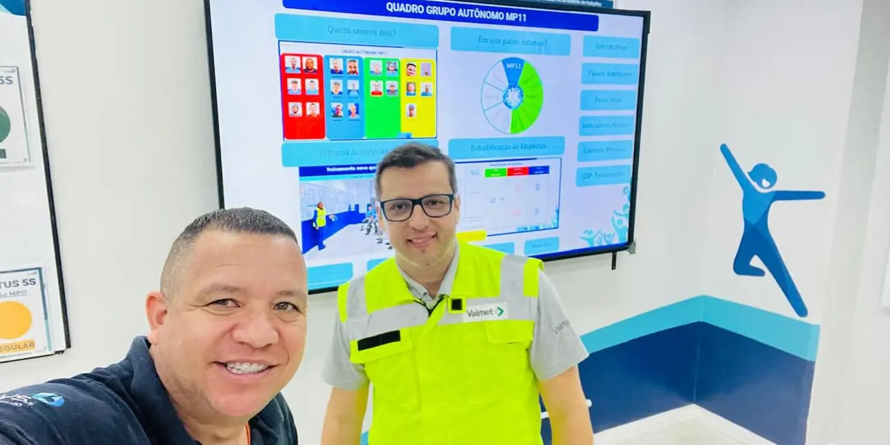 Valmet and Softys personnel working together in a control room at the mill